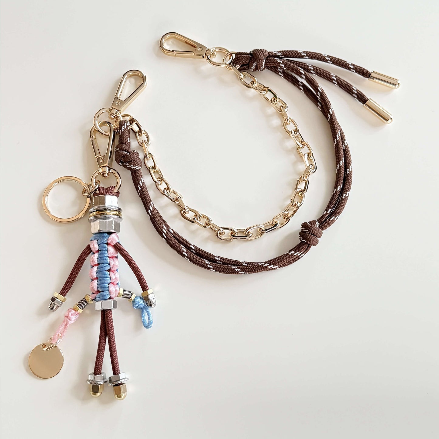 Bag charm with cord and chain in brown