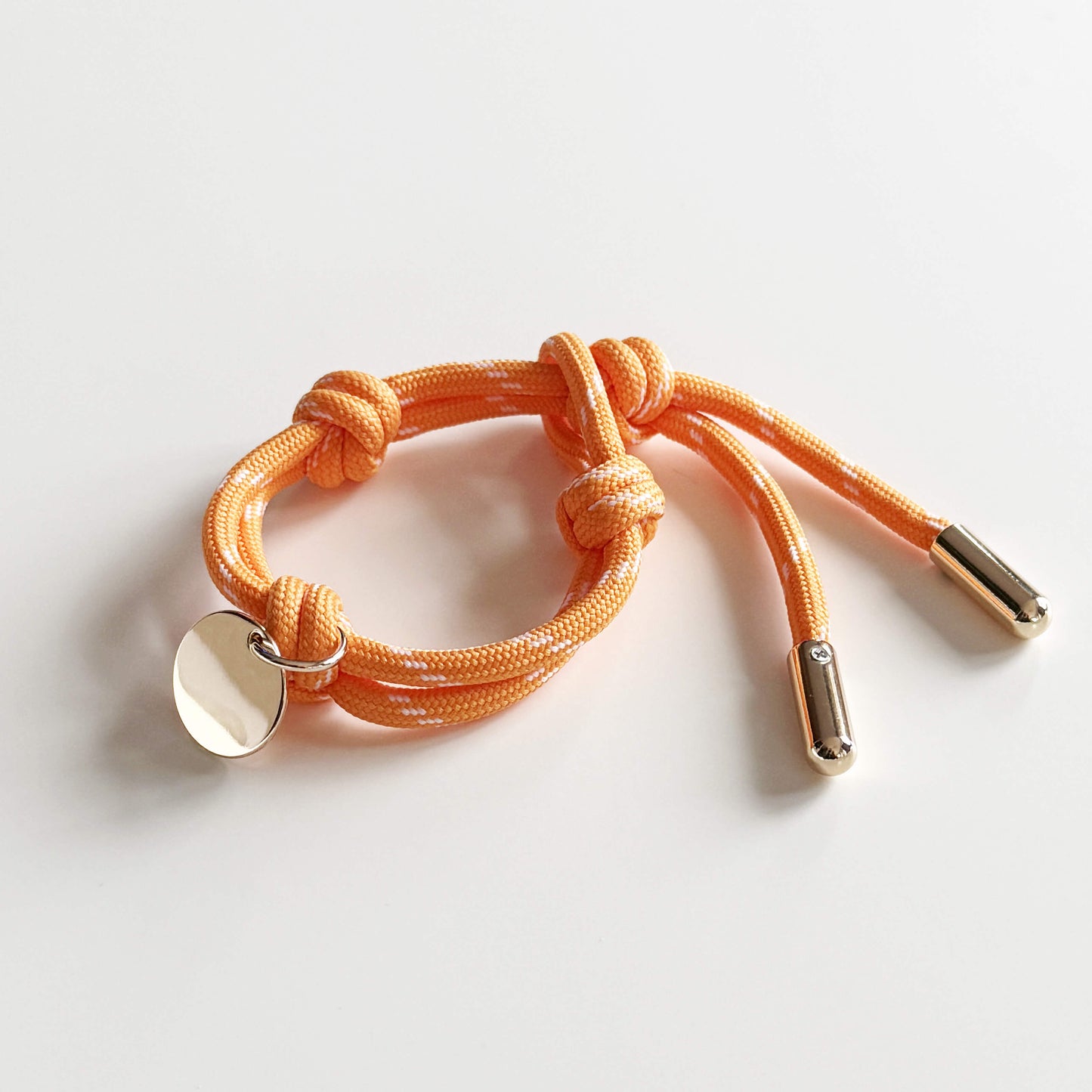 Apo cord bracelet in orange