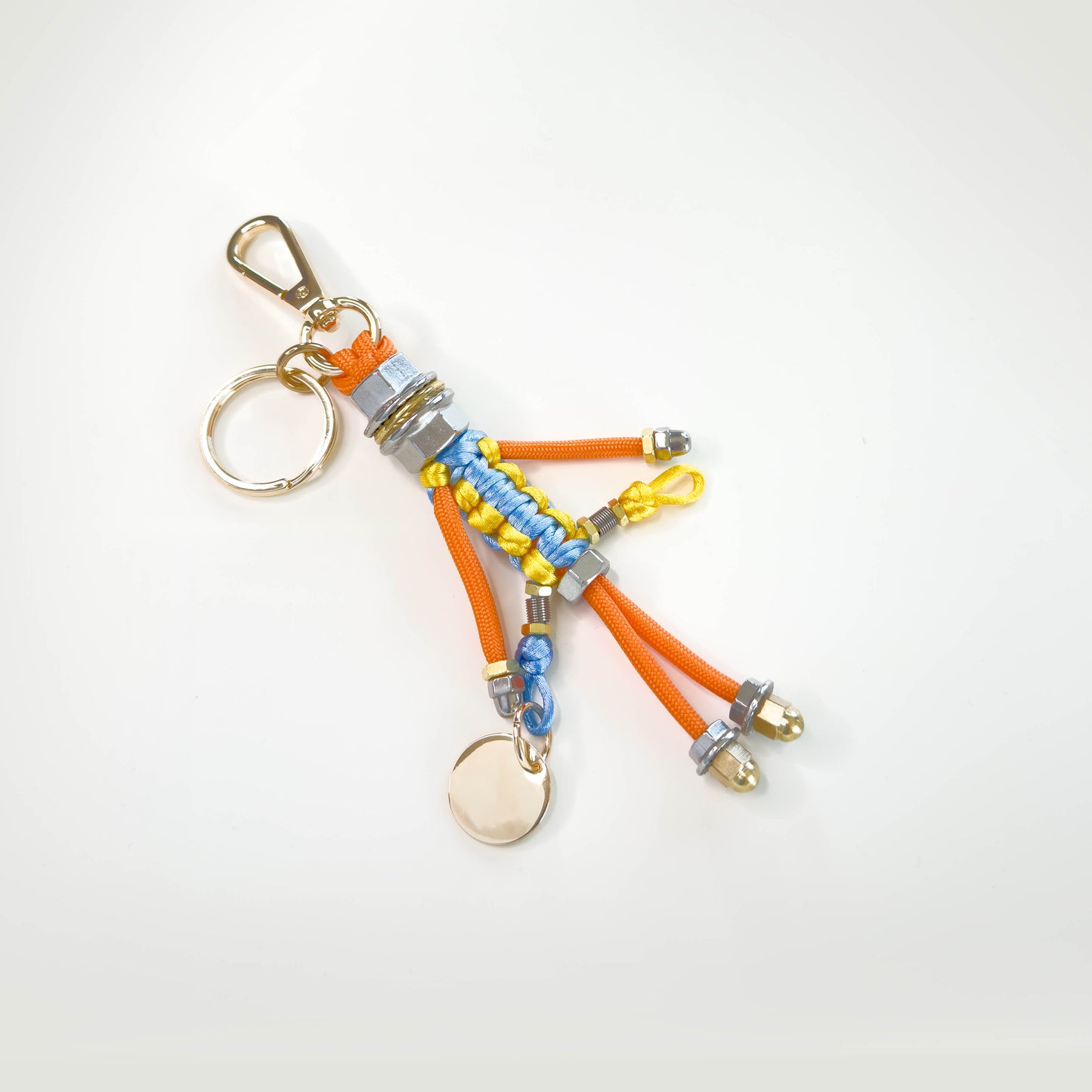 Bag charm with cord and chain in orange