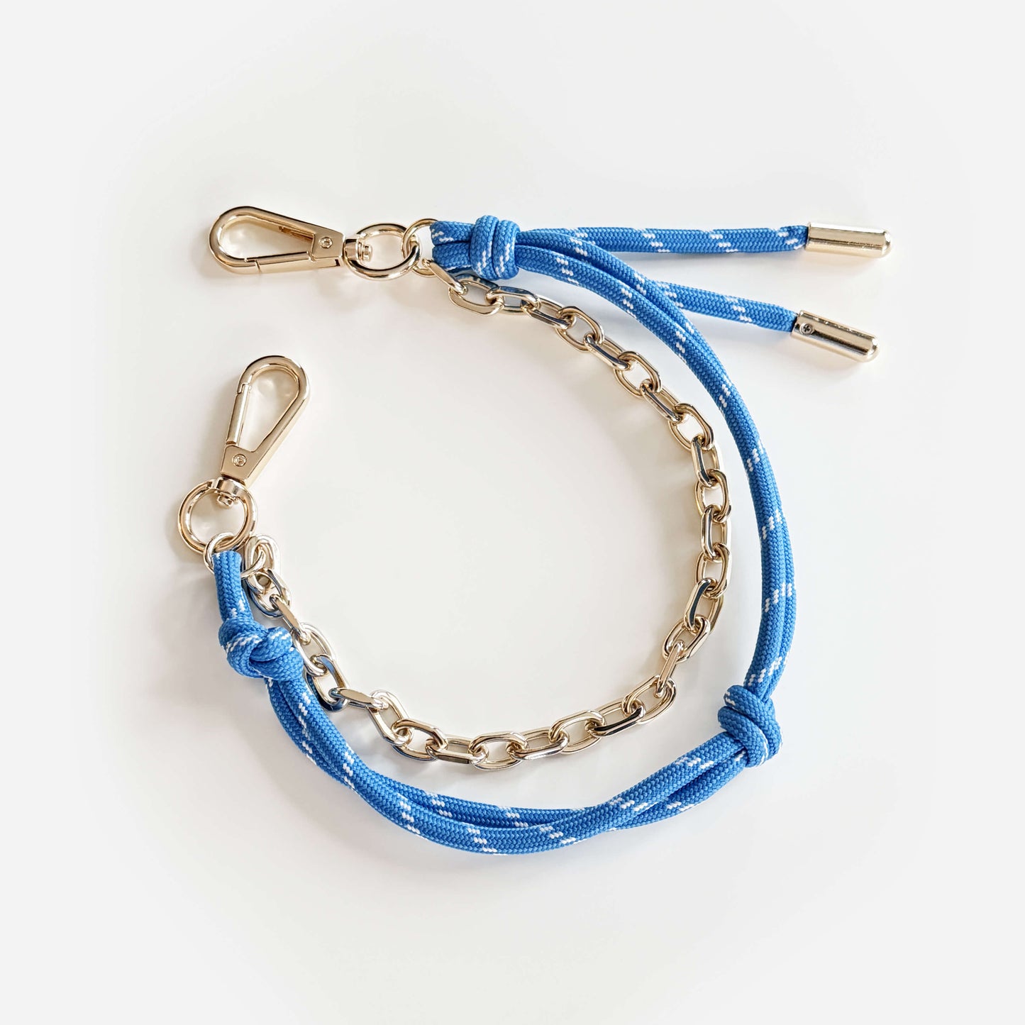 Bag charm with cord and chain in blue