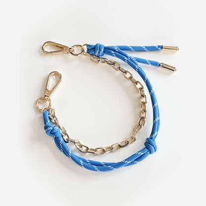 Bag charm with cord and chain in blue