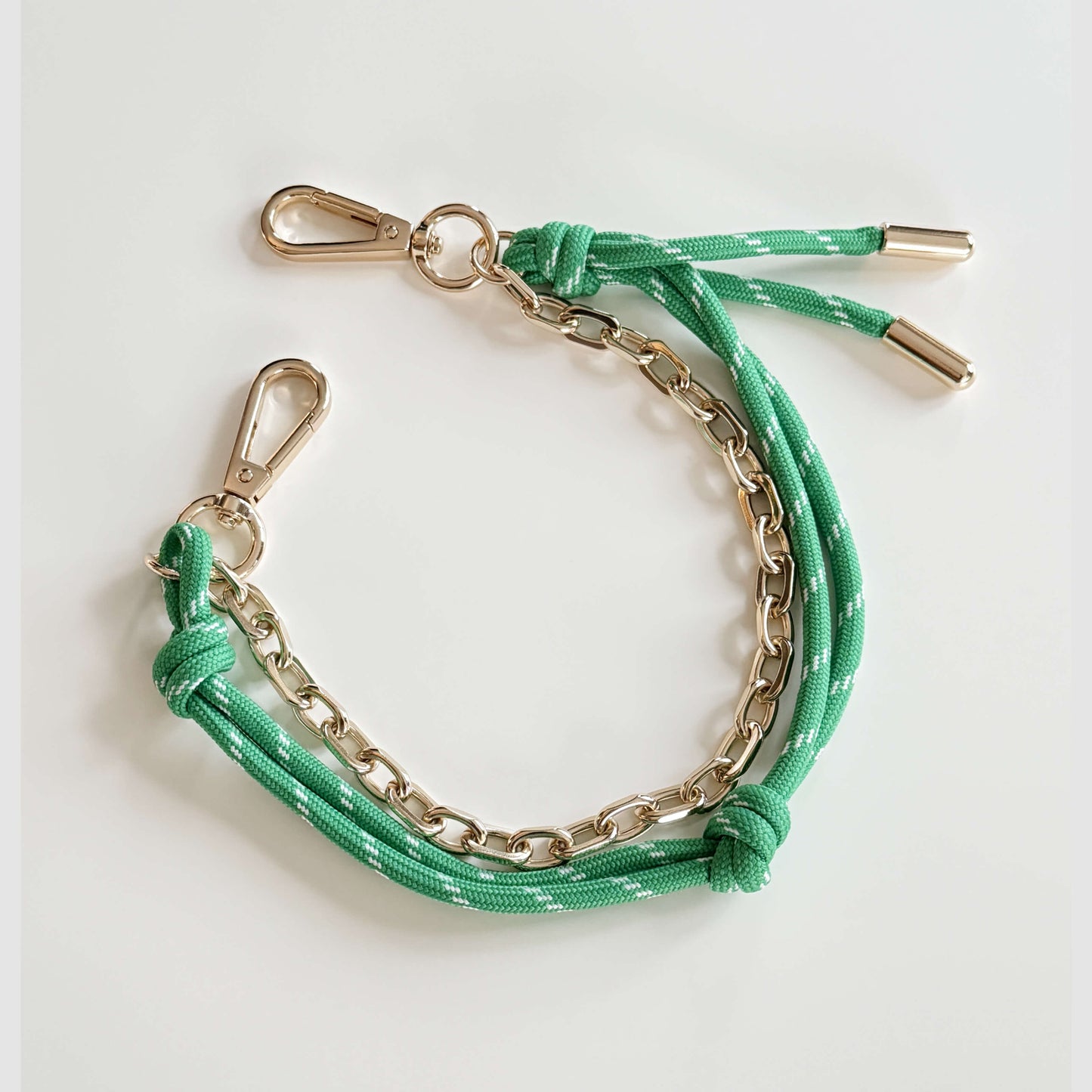 Bag charm with cord and chain in green
